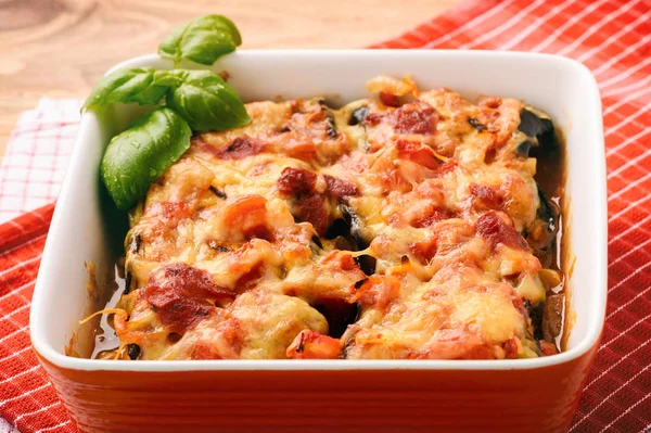 Casserole with roasted eggplants stuffed with minced meat. — Stock Photo, Image