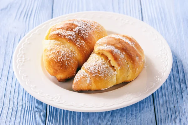 Homemade sweet croissants stuffed with cheese. — Stock Photo, Image
