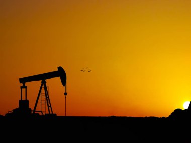 Güzel gün batımı ile siluet petrol kuyusu ışın pompa