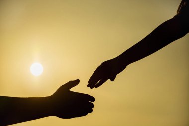 siluet el kavramı ve barış Uluslararası günü yardım etme. Destek. günü peace.friendship.help beni