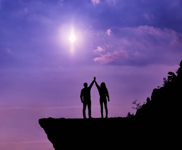 two happy friends on the mountain