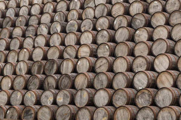 Large pile of whisky barrels — Stock Photo, Image