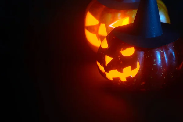 Calabazas brillantes en humo azul —  Fotos de Stock