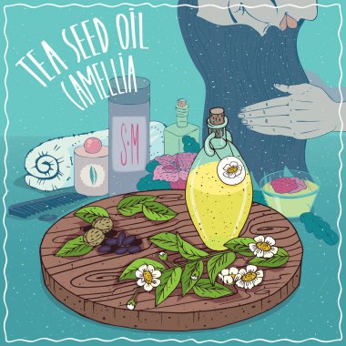 Çay tohumu yağı saç bakımı için kullanılan