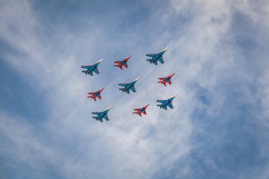 Victory day parade may 9 in Moscow parade of military equipment combat aircraft aerospace forces of the Russian Federation aviation group Swifts and knights Cuban diamond clipart