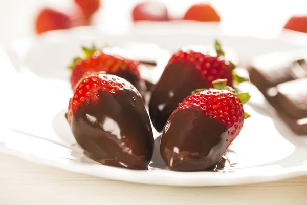 Strawberries in chocolate — Stock Photo, Image