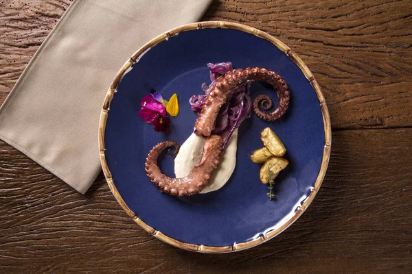 Delicious octopus dish with white tartufo — Stock Photo, Image