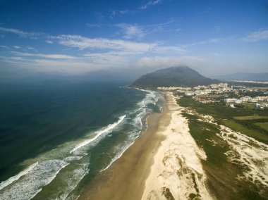 FLORIANOPOLIS, SANTA CATARINA ISLAND, BRAZIL - Costao do santinho Beach Florianopolis, Santa Catarina. July, 2017 clipart