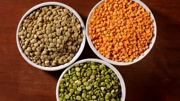 Assorted Lentils Rotating Wood Background — Stock Video