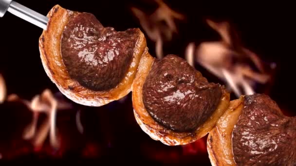Picanha 传统的巴西烧烤与火背景 — 图库视频影像