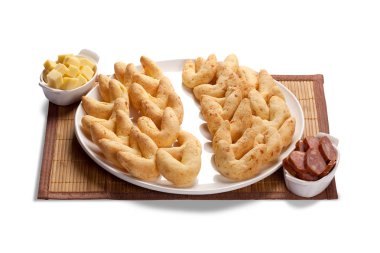 Peynirli çörek veya peynir ekmek ve calabrese topuz, popüler snack ve kahvaltı gıda Brezilya, Kolombiya, Ekvador, Arjantin ve Paraguay.