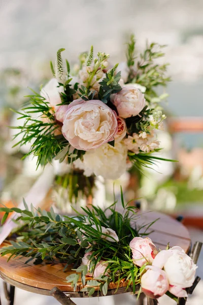 wedding bouquet orchids and peonies