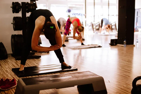 Legs stretching group training — Stock Photo, Image