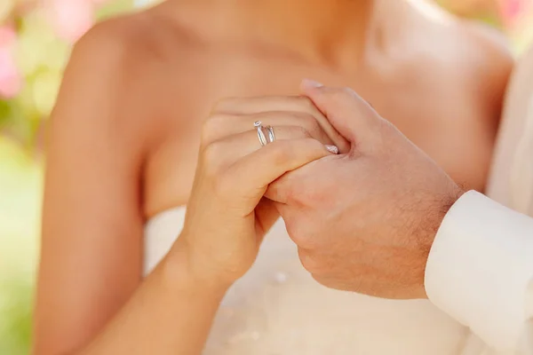 Lovely couple holding hands together — Stock Photo, Image