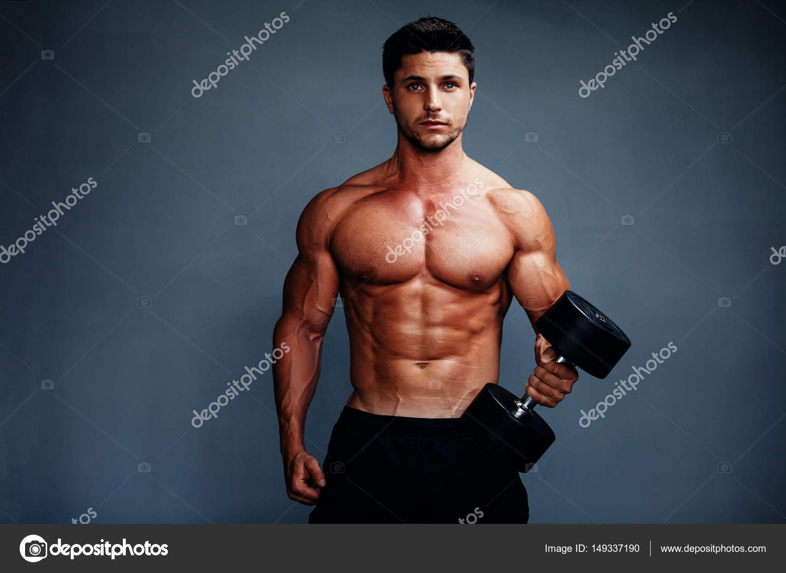 ハンサムな筋肉ボディービルダー ポーズ ストック写真 C Shevtsovy