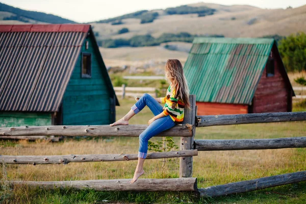 woman travel village alone