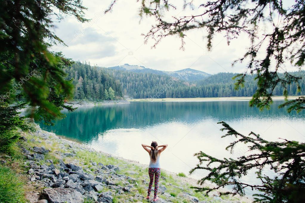 woman travel in beautiful lake and forest