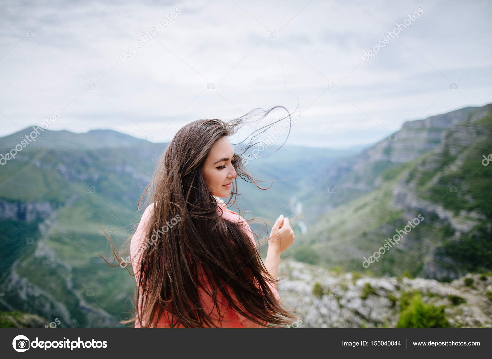 Hair Blowing In Wind Stock Photo by ©shevtsovy 155040044