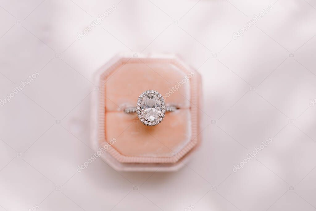engagement ring with big diamond. Beautiful luxury engagement ring. Wedding fine art photo