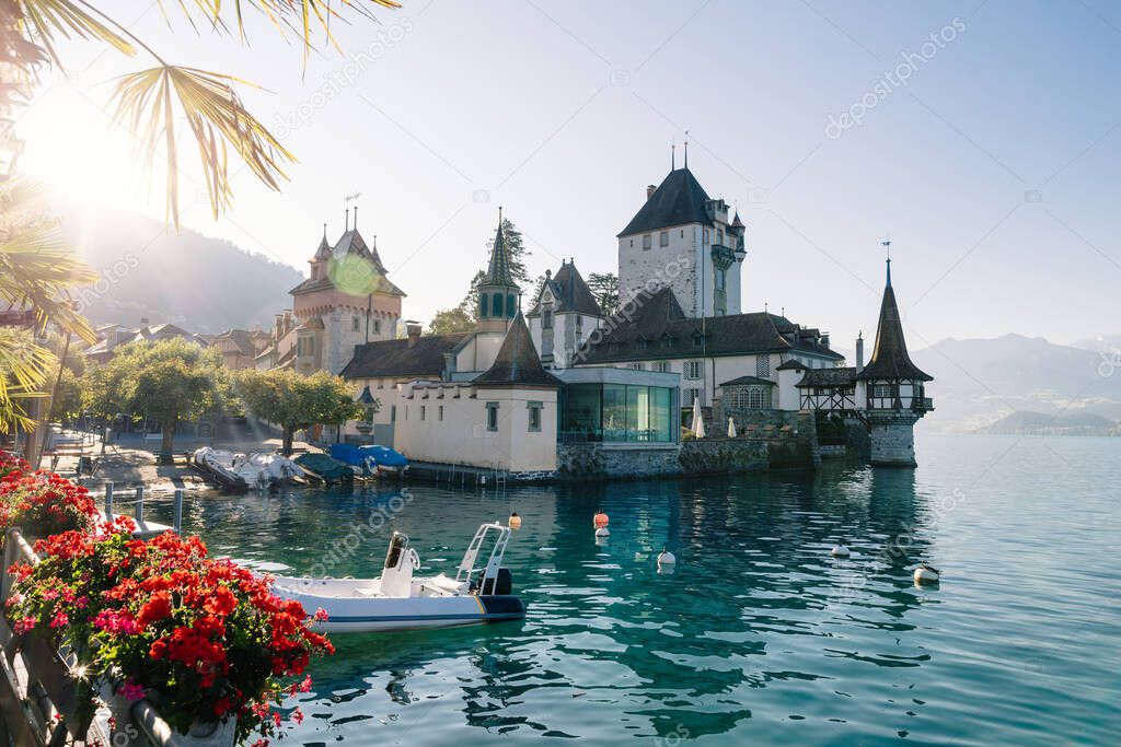 Lake and castle view with mountains in Switzerland, Interlaken