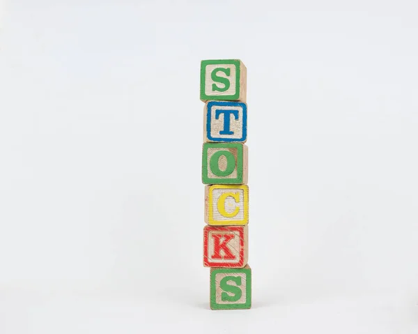 Ordet bestånden i trä Childrens block — Stockfoto