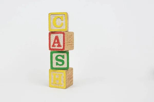 Ordet kassa i trä Childrens block — Stockfoto