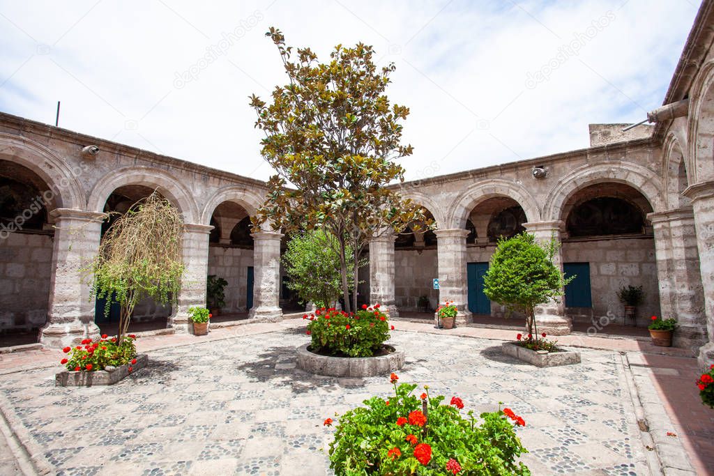 Courtyard with trees and flowers in the monastery Saint Catalina, Arequipa, Peru