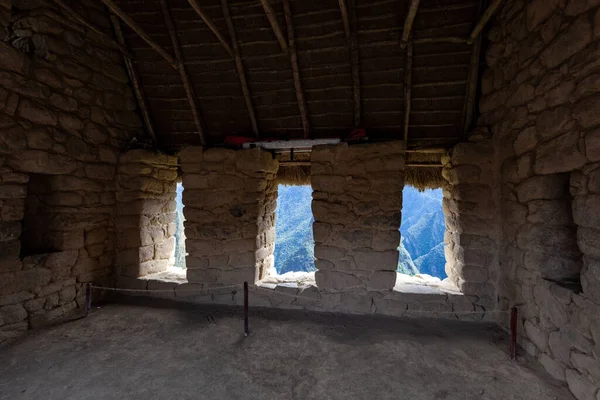Stone house with windows, inside view, Machu Picchu Peru.