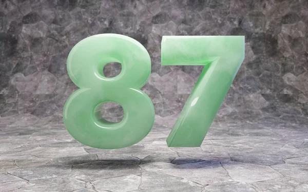 Jade number 87 on rocky backgrond — Stockfoto