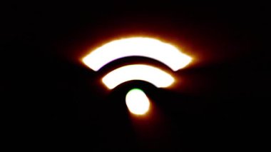 Shiny fire Wi-Fi icon fly in center flickers with rgb spectrum colors.
