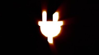 Shiny fire plug icon fly in center flickers with rgb spectrum colors.