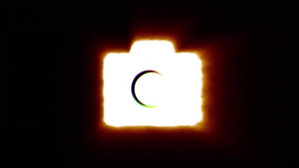Shiny fire photo camera icon fly in center flickers with rgb spectrum colors. — Stok video