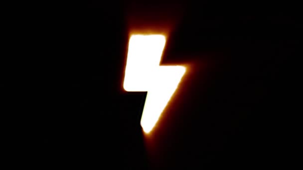Shiny fire lightning icon fly in center flickers with rgb spectrum colors. — Stockvideo