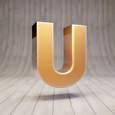 Ahşap zemindeki büyük harfli U harfi. 3D gösterişli altın alfabe karakteri.
