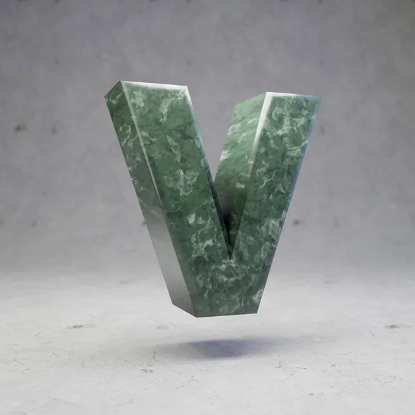Green marble letter V uppercase on concrete background. 3d rendered glossy stone font character.
