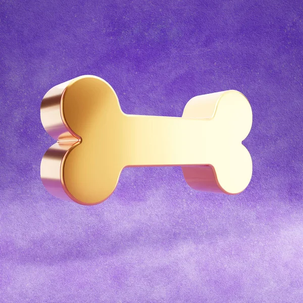 Bone icon. Gold glossy Bone symbol isolated on violet velvet background.