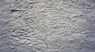 Gri taş duvar spreyi desenli ve çizik kabartmalı.