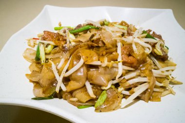 Fried Kuey Teow ile sığır eti, Malezya'da popüler