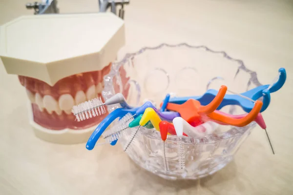 Various type of floss and inter-dental brushes — Stock Photo, Image