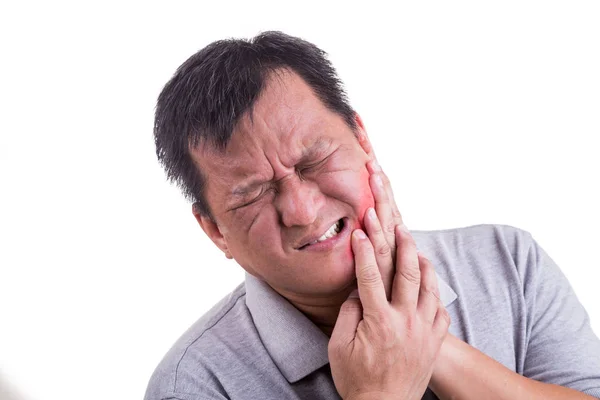 Dojrzały człowiek cierpi ból intensywny ból zęba z rąk nad fac — Zdjęcie stockowe
