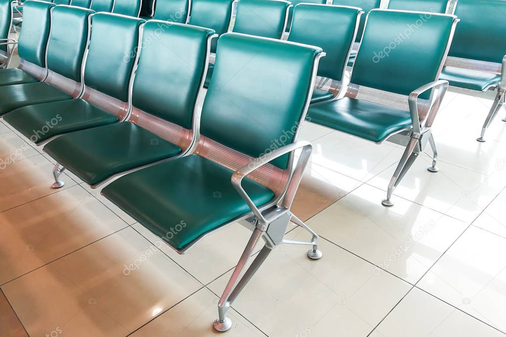 Rows of empty chairs at waiting area