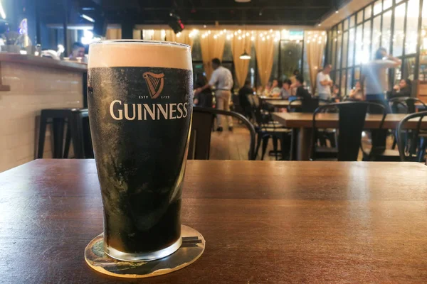 Kuala Lumpur, Malaysia, July 1, 2017:  Guinness is an Irish dry tout that originated in the brewery of Arthur Guinness at St. James's Gate brewery, Dublin, Ireland. Leading black stout in Malaysia — Stock Photo, Image