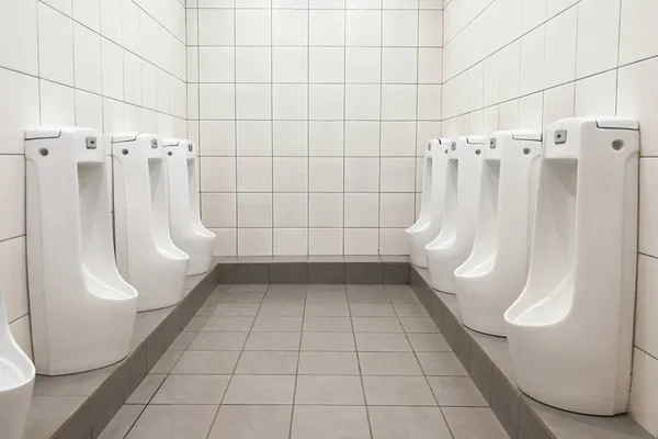 Modern clean hygienic men urinal ware in public washroom toilet — Stock Photo, Image