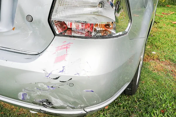 Minor dent scratches on bumper of car involved in accident — Stock Photo, Image