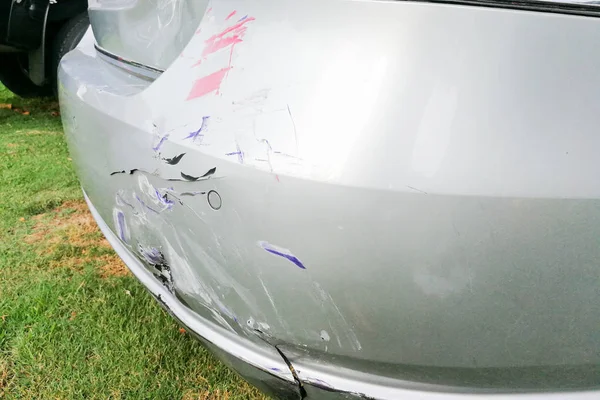 Minor dent scratches on bumper of car involved in accident — Stock Photo, Image