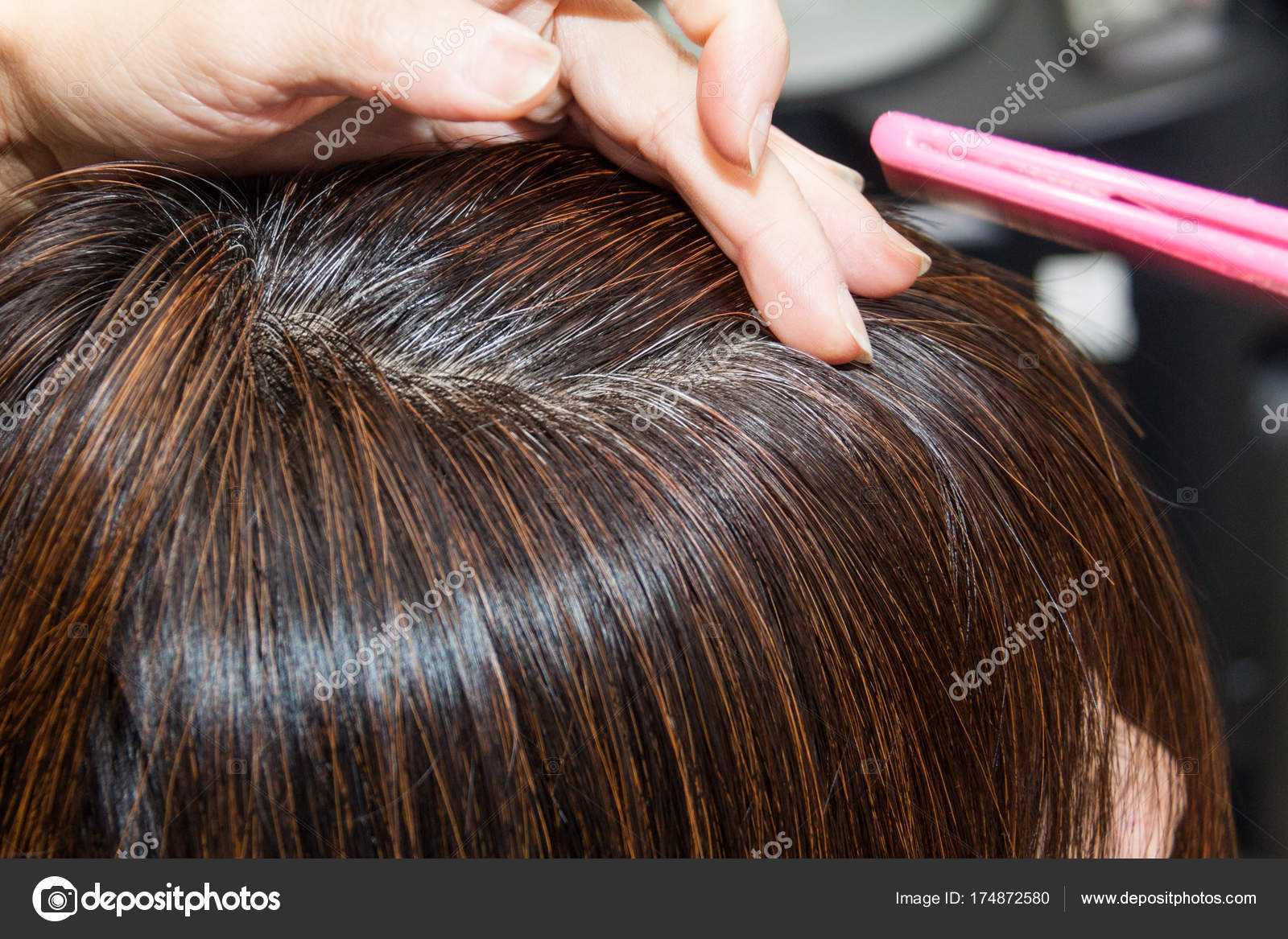 Close-up on gray hair roots of woman against dark hair Stock Photo by  ©Thamkc 174872580