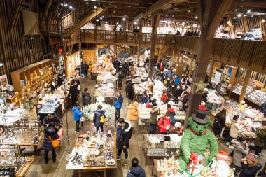 Otaru, Japan, January 28, 2018: Shoppers and tourist shopping fo clipart