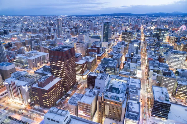 Sapporo, Japan, January 28, 2018: Dusk hour aerial view of centr — Stock Photo, Image