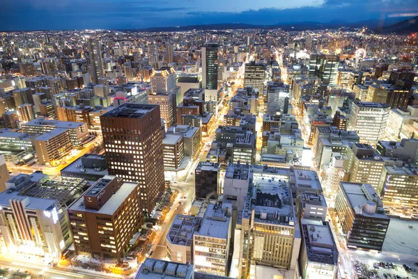 Sapporo, Japan, January 28, 2018: Dusk hour aerial view of centr — Stock Photo, Image