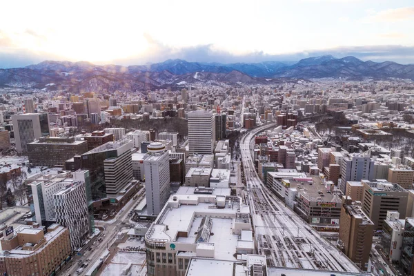 Sapporo, Japón, 28 de enero de 2018: Vista aérea al atardecer del centro — Foto de Stock